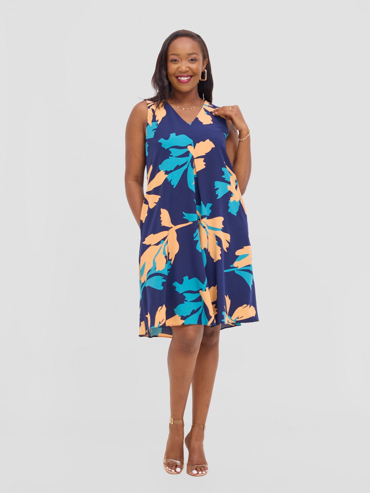 Vivo Ava Front Pleat Knee Length Dress - Peach / Teal Print