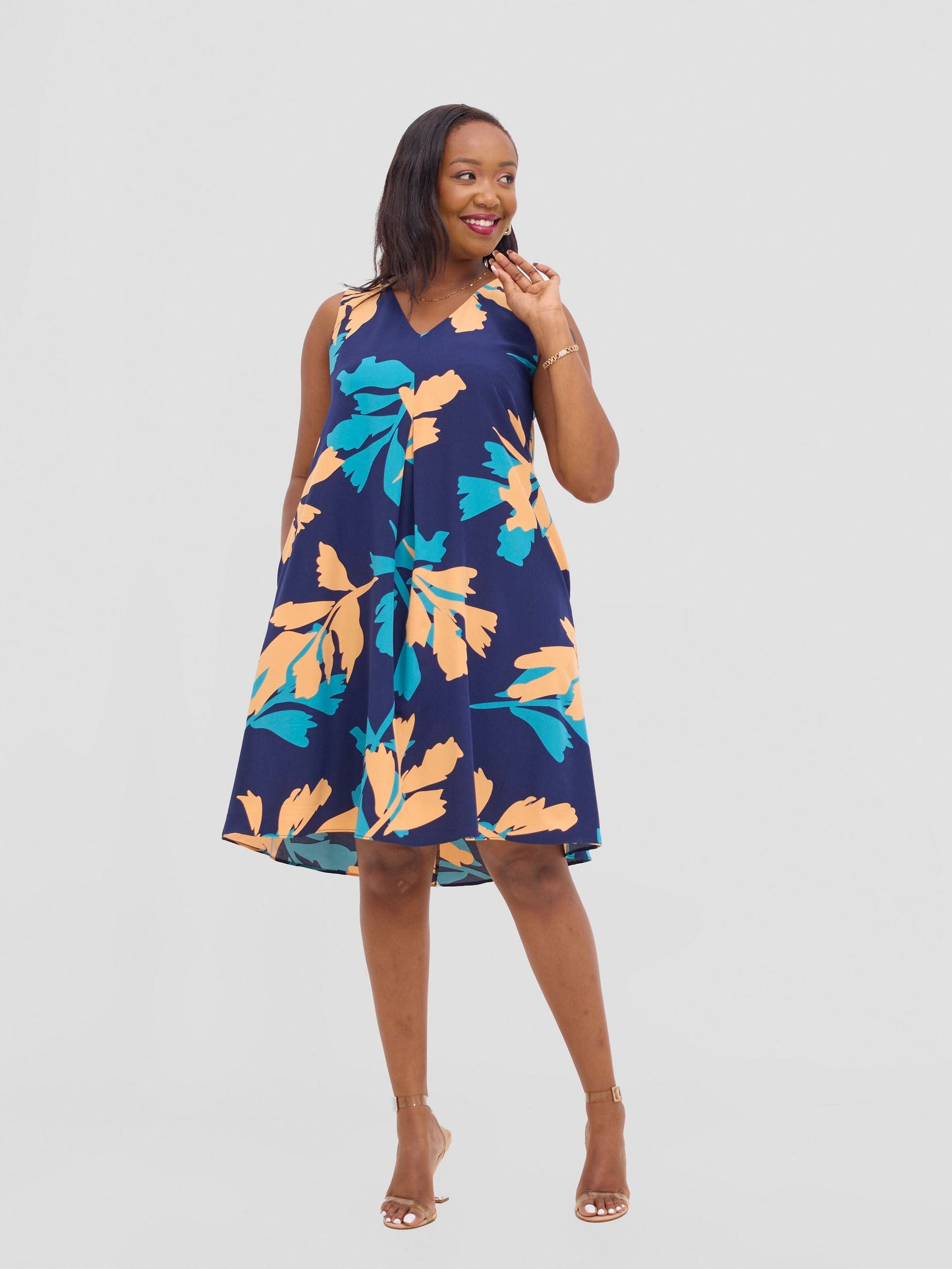 Vivo Ava Front Pleat Knee Length Dress - Peach / Teal Print