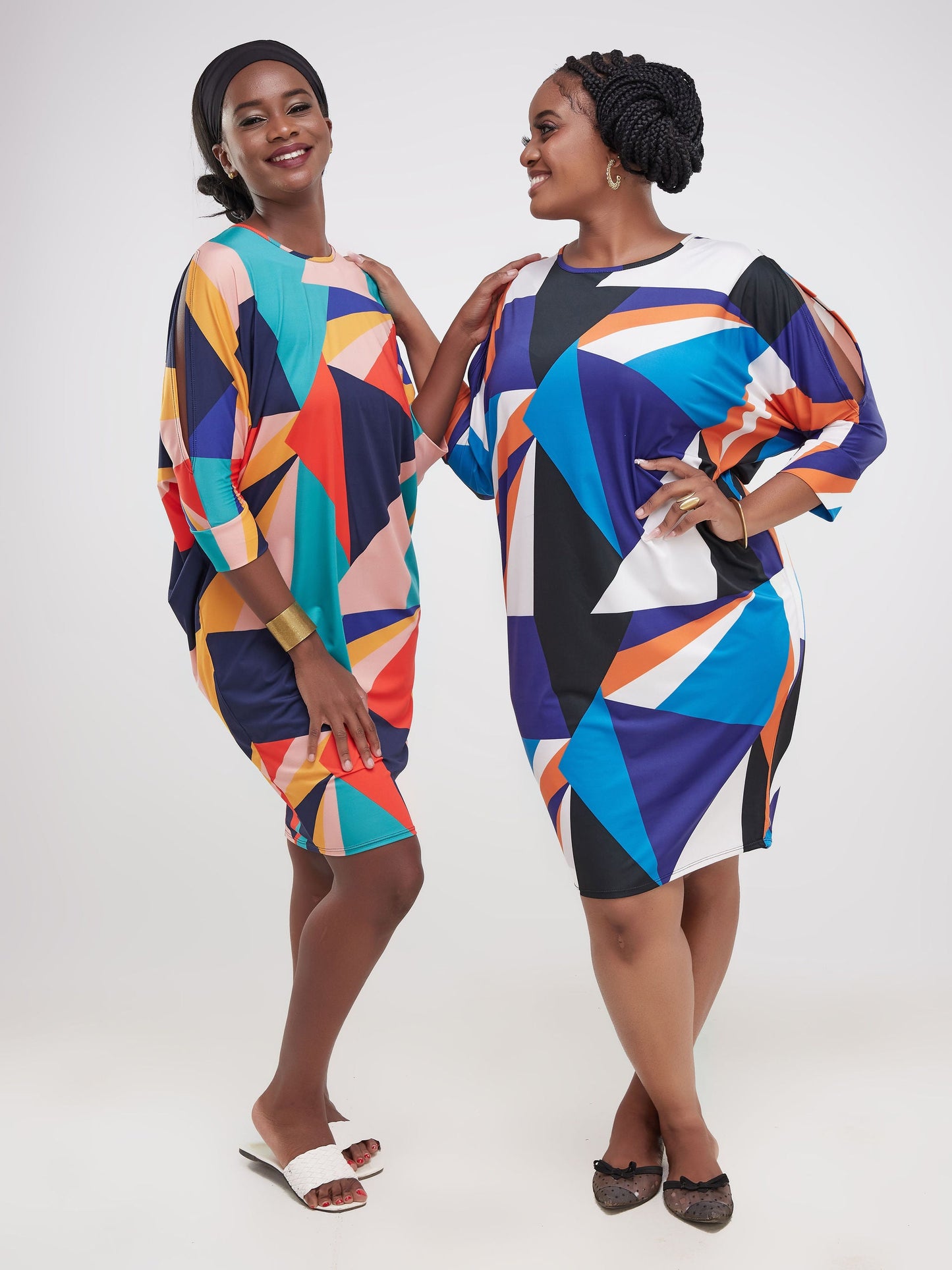 Vivo Ruwa Cold Shoulder Knee Length Dolman Dress - Orange Triangle Abstract Print