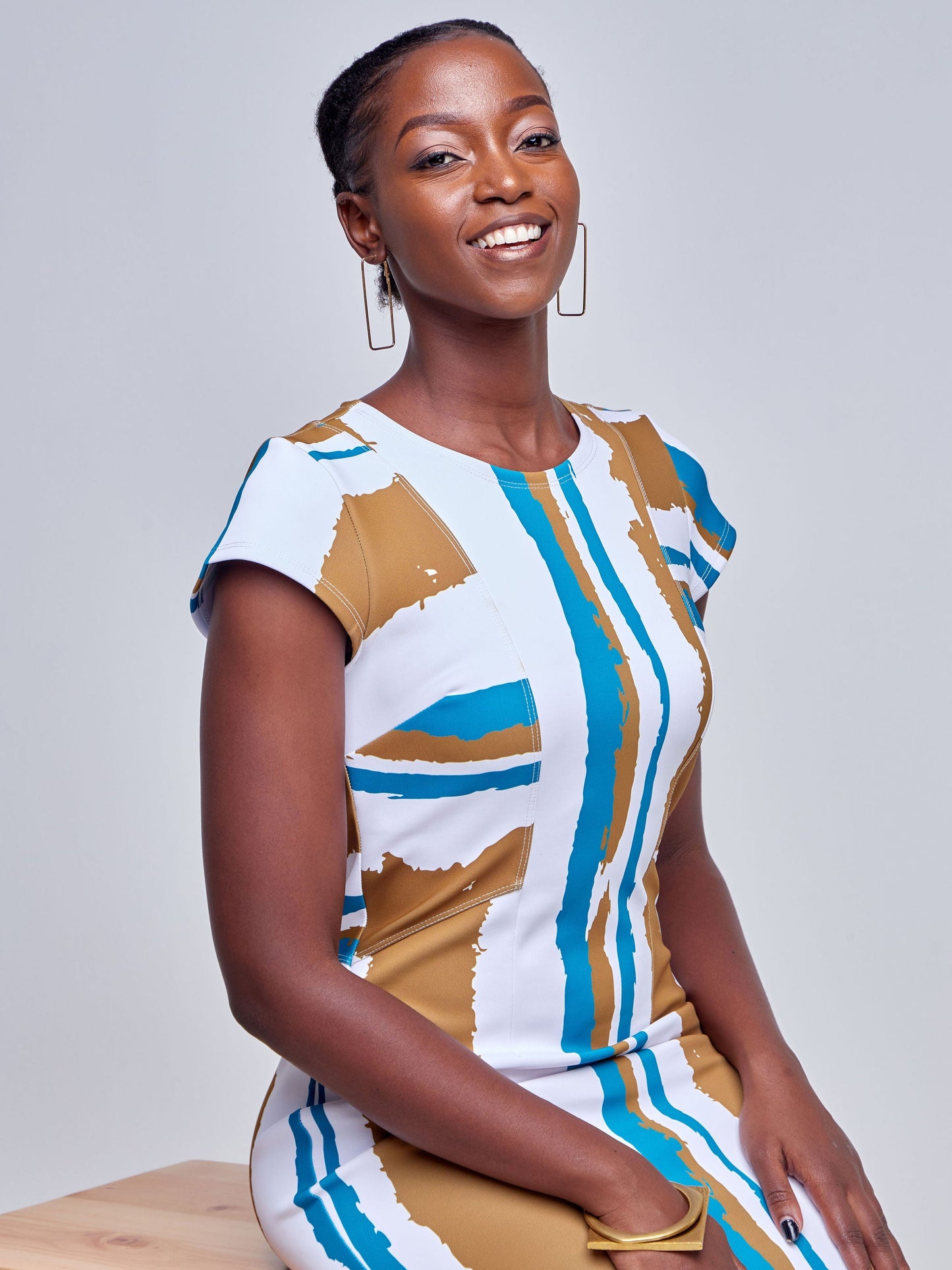 Vivo Tatili Cap Sleeved Panel Sheath Dress - Rust / Teal Abstract Print