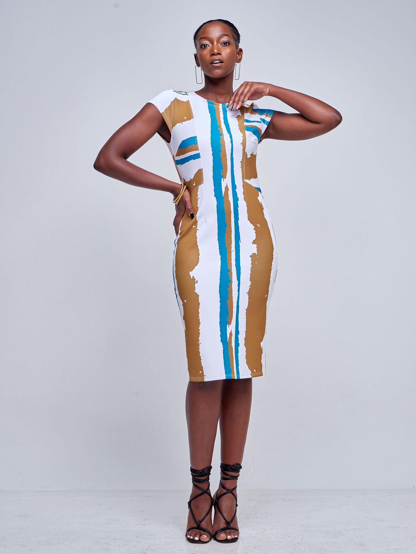 Vivo Tatili Cap Sleeved Panel Sheath Dress - Rust / Teal Abstract Print