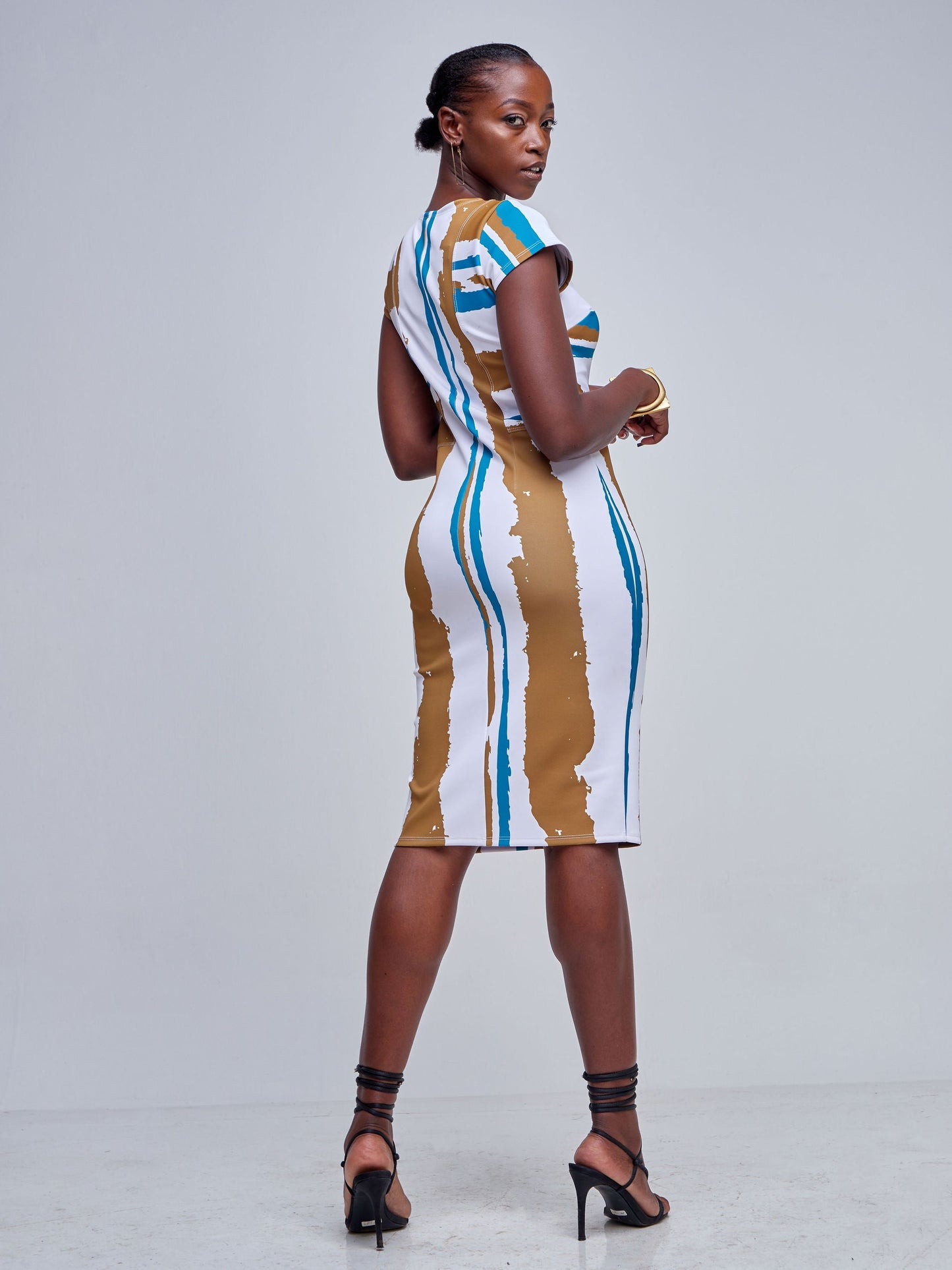 Vivo Tatili Cap Sleeved Panel Sheath Dress - Rust / Teal Abstract Print